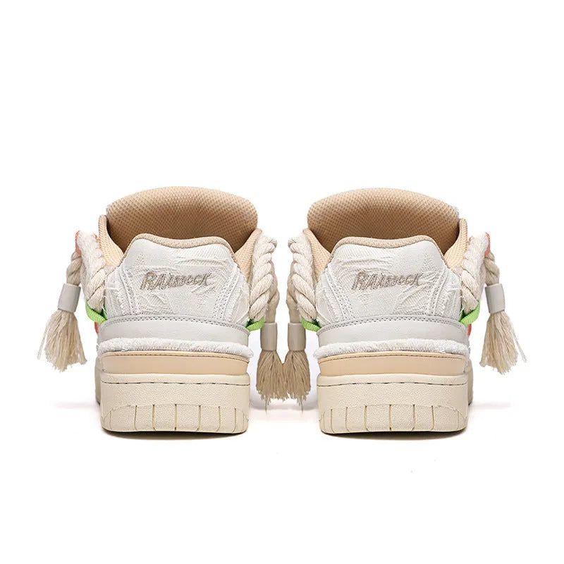 Creamy white old damage retro skate shoes with lace-up front, platform heel, and round toe.