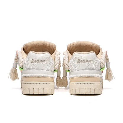 Creamy white old damage retro skate shoes with lace-up front, platform heel, and round toe.
