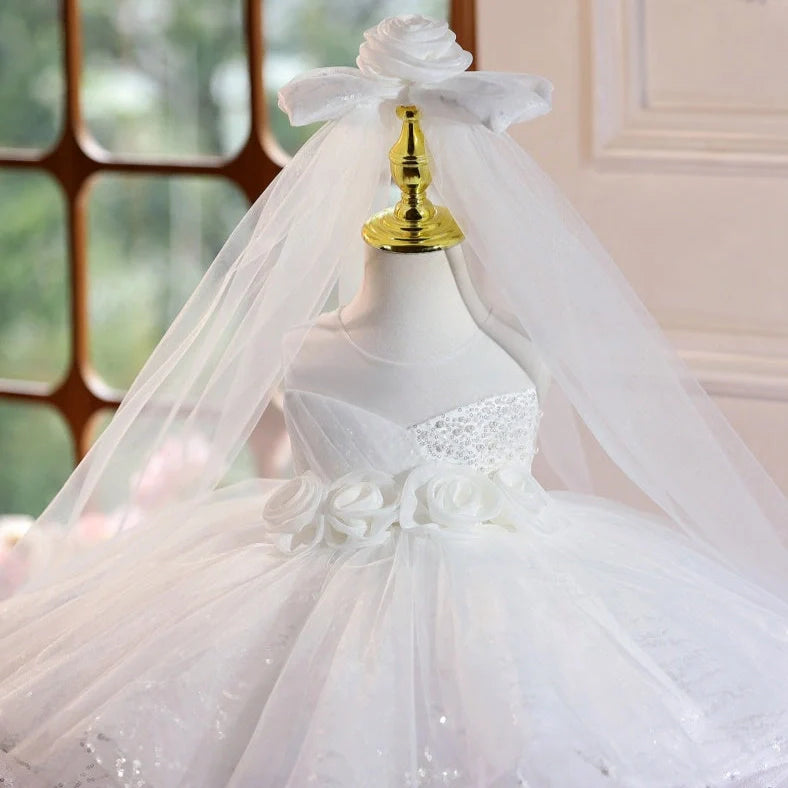 White children's princess wedding dress with sleeveless design and round neck collar