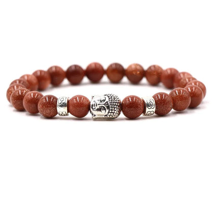 Natural stone stretch bracelet with round beads in various colours including Tigereye and turquoise.