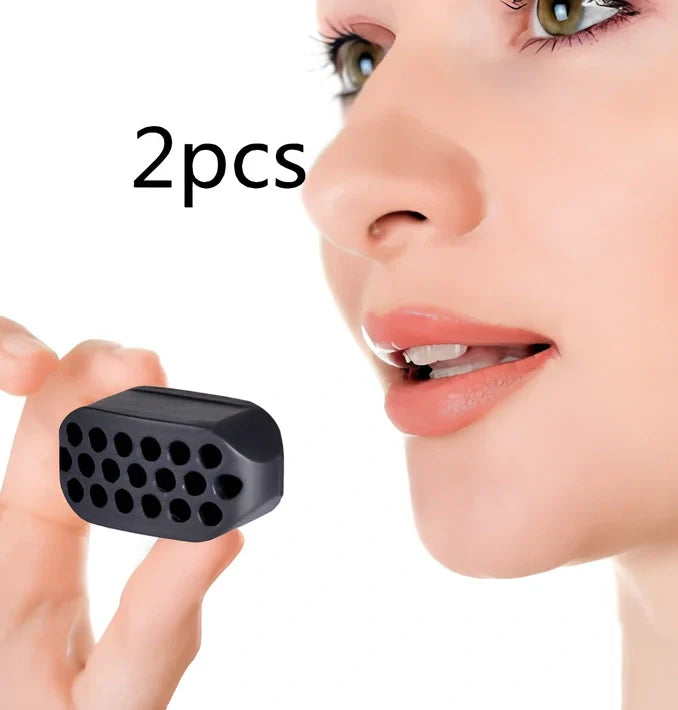 Compact black silicone jaw trainer for muscle shaping, food-grade material, portable at 5cm size for daily facial exercises