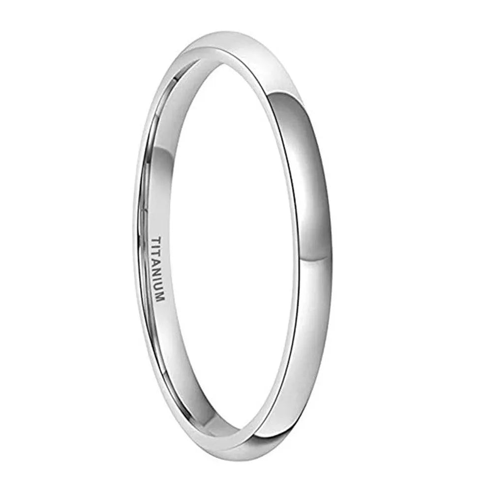 Silver titanium steel unisex ring with grinding texture on finger, showing different band width options.