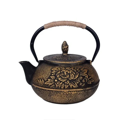 Japanese-style cast iron teapot with lid on a hob, shown in a bronze finish.