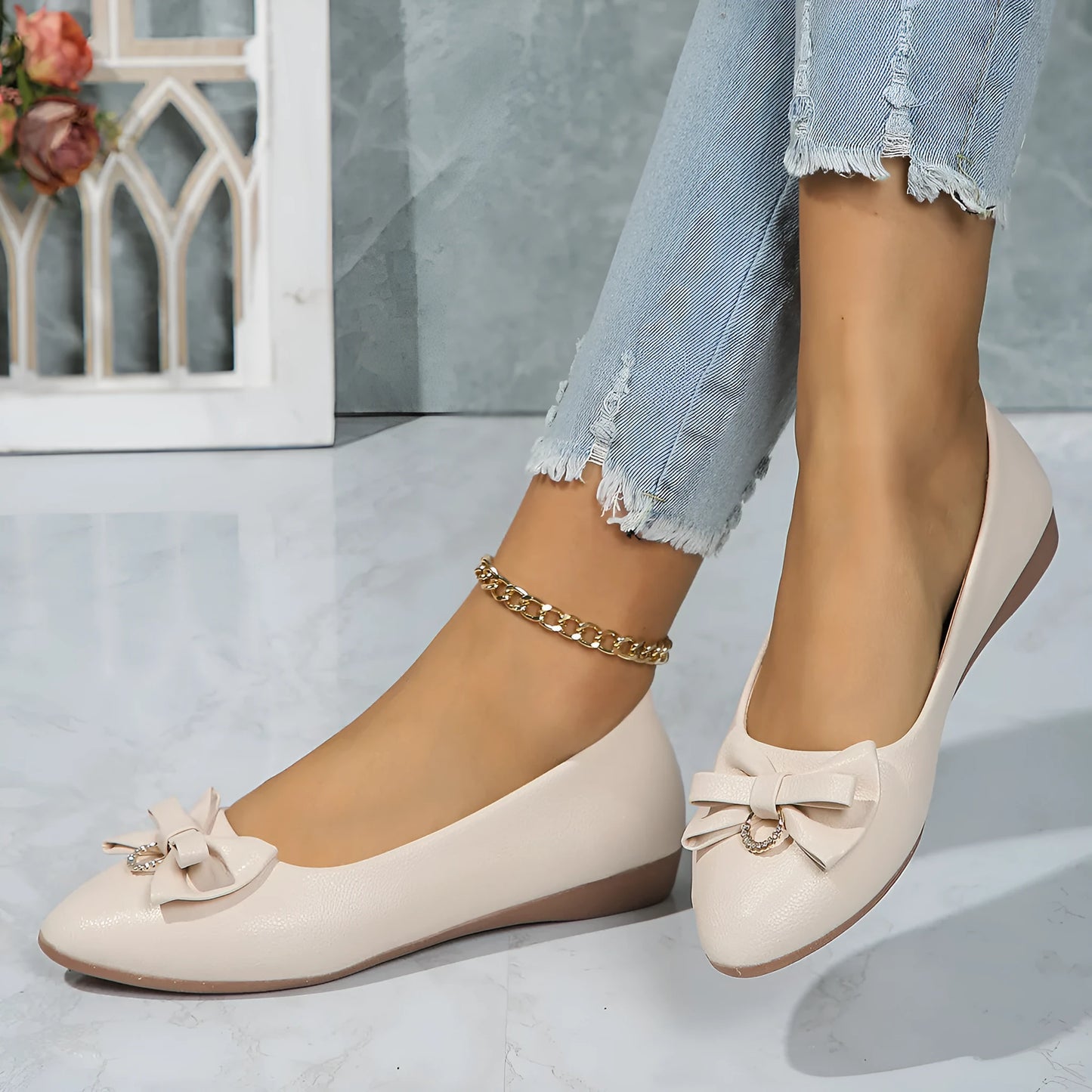 Women's beige flat casual slip-on shoes with bowknot detail and shallow mouth design
