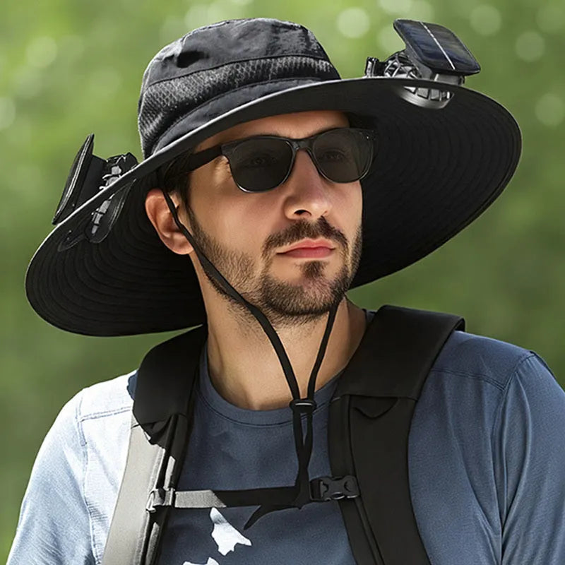 Man wearing a solar-powered fisherman hat with built-in fan for outdoor fishing or hiking