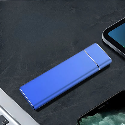 Sapphire blue portable solid state hard drive with metal case measuring 10.3cm