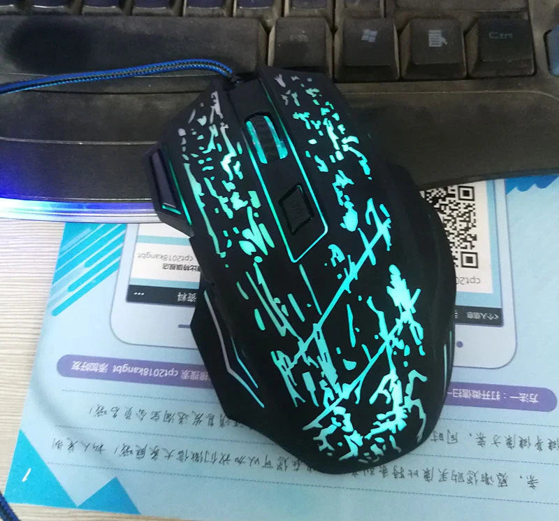 Precision Gaming Mouse with 7-Color LED Backlighting and 5500 DPI Optical Sensor for Immersive PC and Laptop Gaming