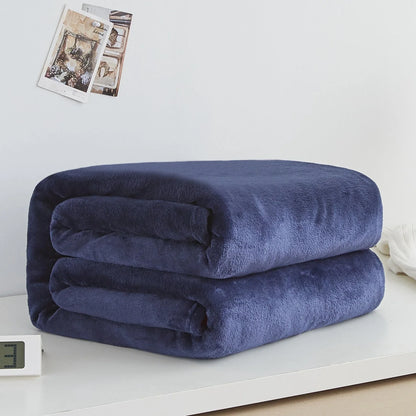 Coral fleece flannel blanket in beige showing textured surface and consistent edges