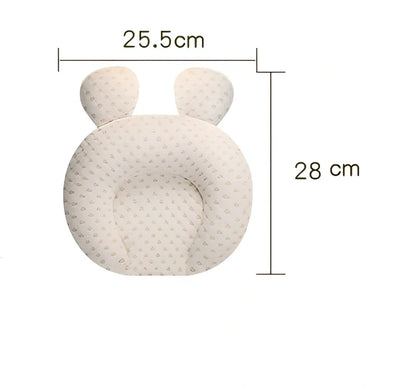 White baby pillow with latex core measuring 30x40cm for infant head support