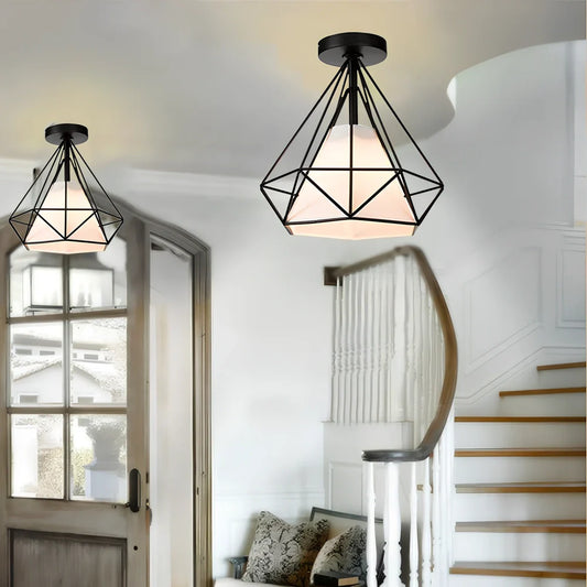 Adjustable ceiling lamp with black finish and extended line against white ceiling
