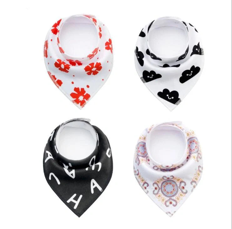 Stylish baby bibs and burp cloths featuring trendy arrow, wave, and triangle designs in soft, absorbent cotton