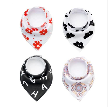 Stylish baby bibs and burp cloths featuring trendy arrow, wave, and triangle designs in soft, absorbent cotton