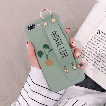 Green graffiti pattern wristband holder phone case for iPhone showing integrated wrist strap and back cover design