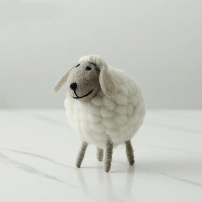 Adorable plush sheep decorations in various sizes and color combinations, perfect for adding a cozy, farmhouse-inspired touch to any home.