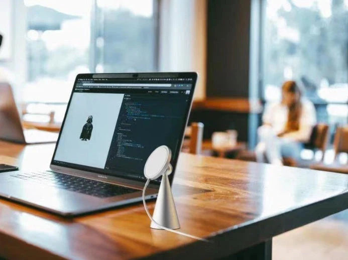 Magnetic phone stand for iPhone 12 and up, made of sleek aluminum alloy with 360-degree rotation for hands-free charging and viewing