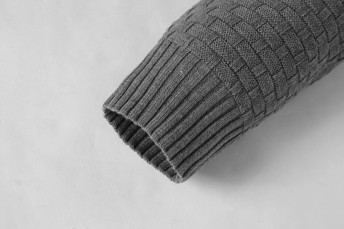 Man wearing a cotton-polyester blend hooded sweatshirt in grey, showing the front design and hood.