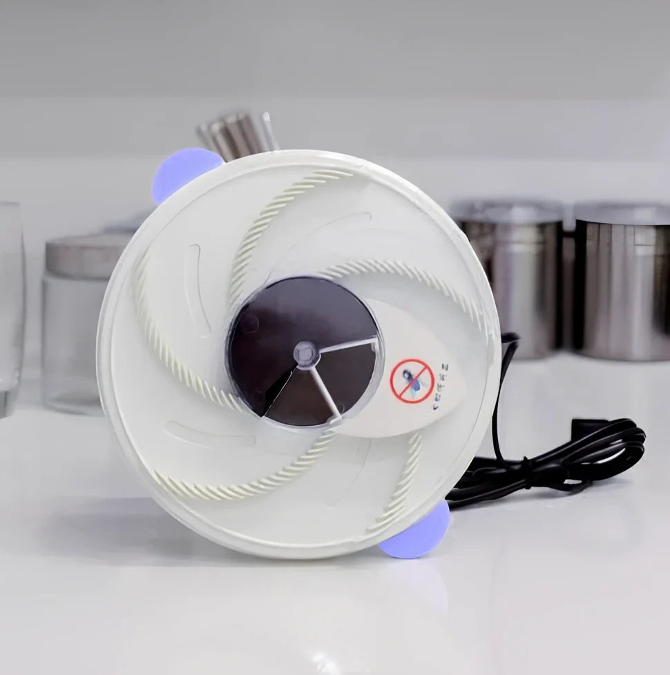 USB electric fly trap in white with blue accents, showing five bait grooves and rotating capture plate for insect control
