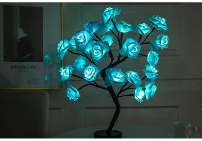 White and red rose flower LED lamp on a bonsai tree stand with warm white lights.