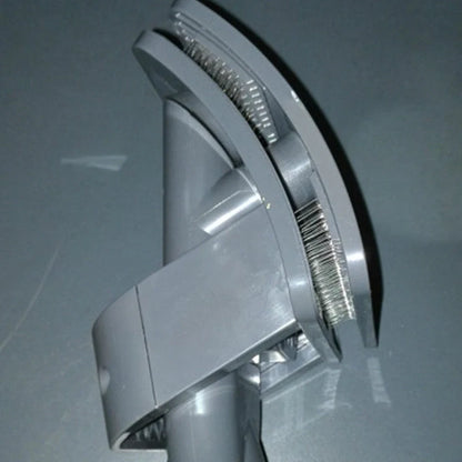 Deep grey pet grooming brush tool with vacuum cleaner attachment measuring 17x10cm