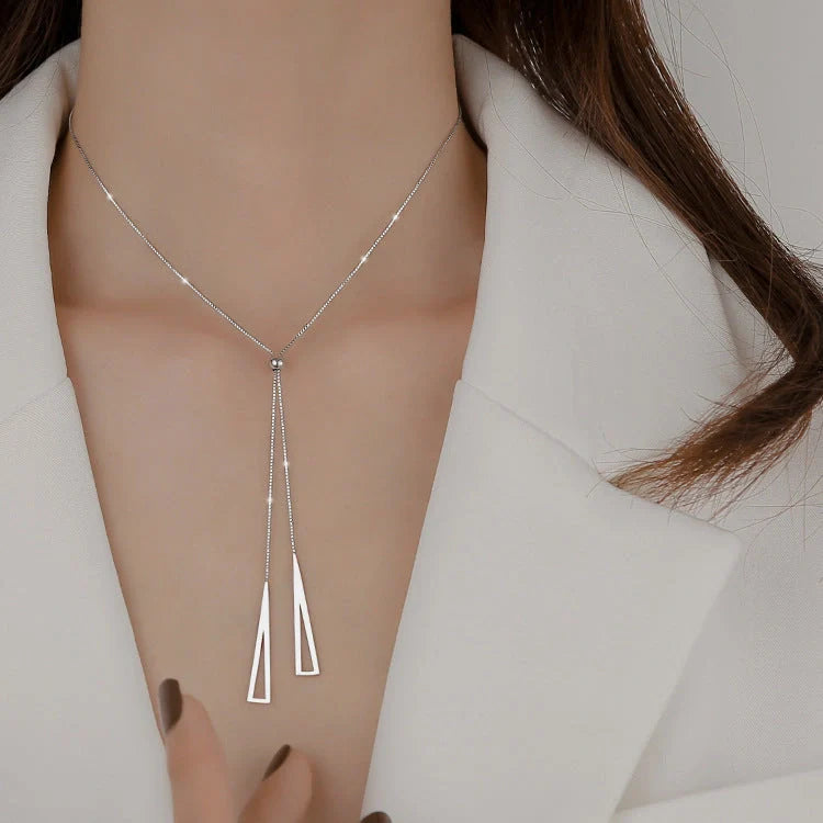 Sterling silver geometric triangle necklace with adjustable clavicle chain in white K