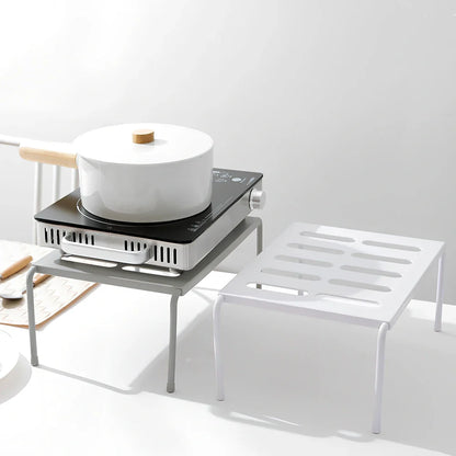 Grey retractable kitchen shelf with hollow grid design extended to 45cm width