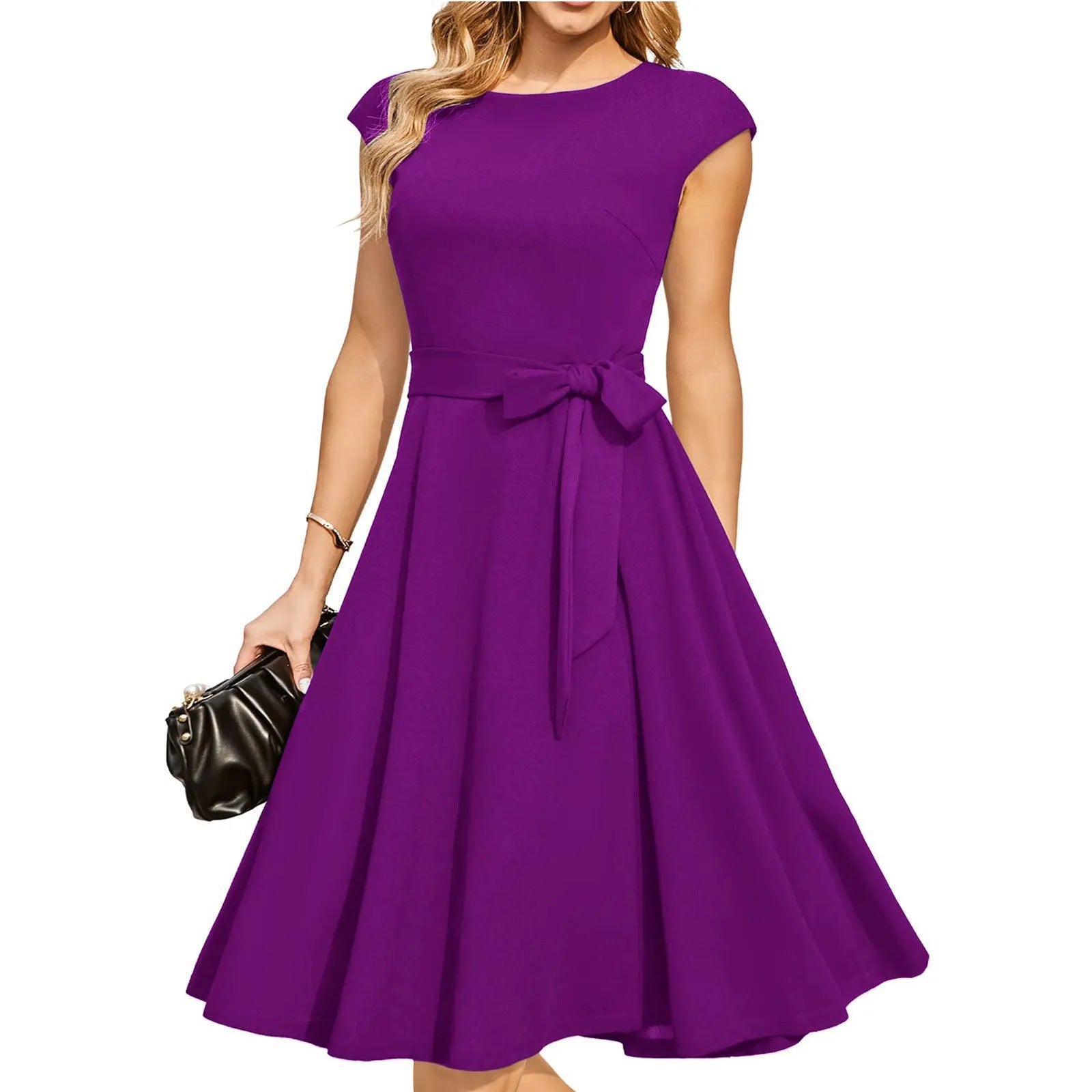 Sleeveless black dress with lace-up waist detail and a flowing swing skirt.