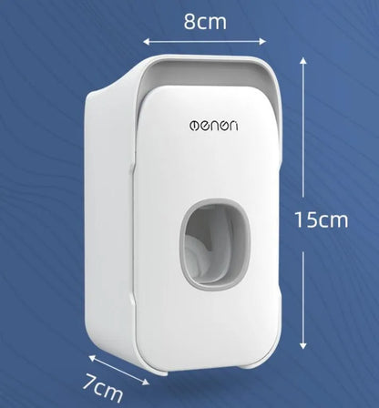 Automatic toothpaste dispenser with motion sensor and LED light in blue, grey or pink colours mounted on bathroom wall