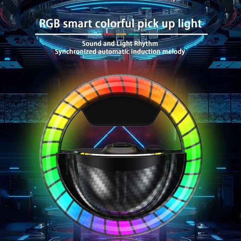 Black Aromatherapy LED rhythm lamp on a desk next to a USB-C cable, showing its compact 85.6mm size.