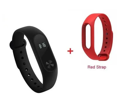 Xiaomi Mi Band 2 black fitness tracker with OLED display showing heart rate and time on adjustable wrist strap