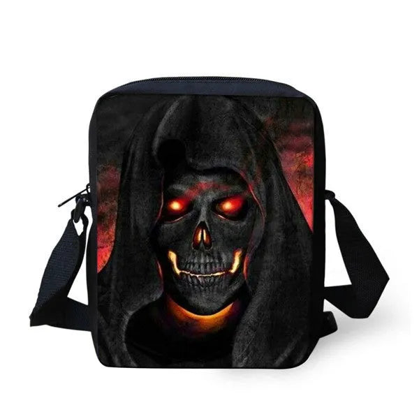 Children's skull print messenger bag with double adjustable straps, shown in a medium size with a zipper pocket.