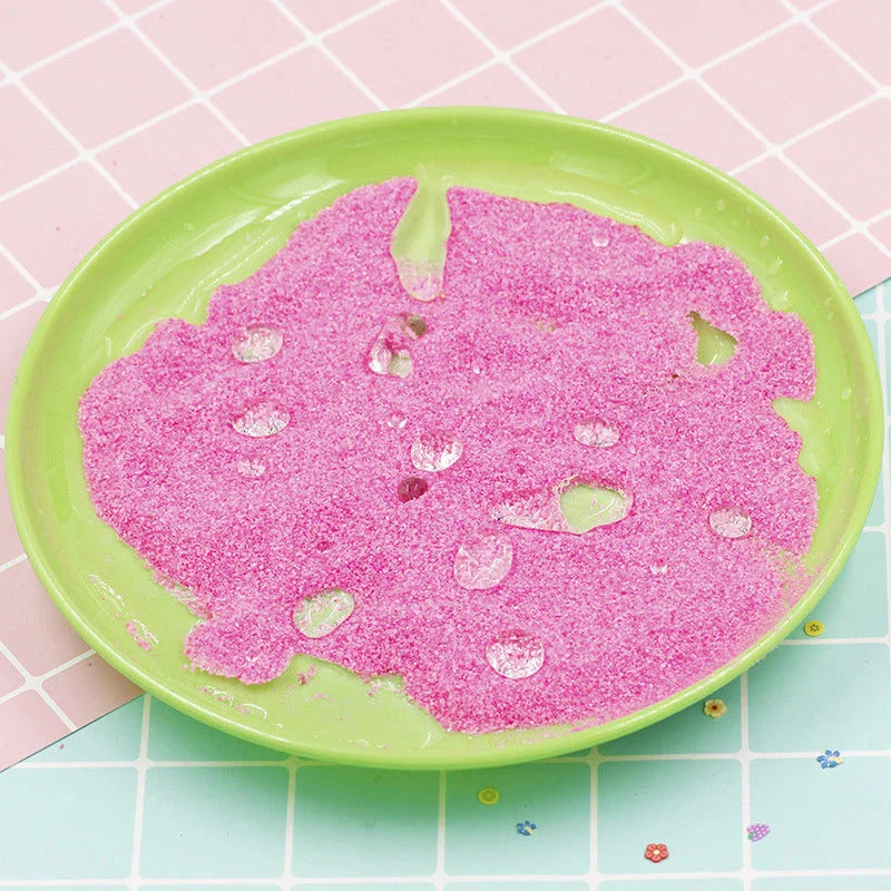 Magical self-adhesive space sand in various colors, allowing for endless creative sculpting and molding even when submerged in water