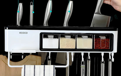 White wall-mounted plastic kitchen storage box for organising tools and utensils