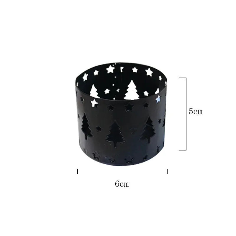 Black iron Christmas candlestick holder with elk bracket design and Santa Claus motifs