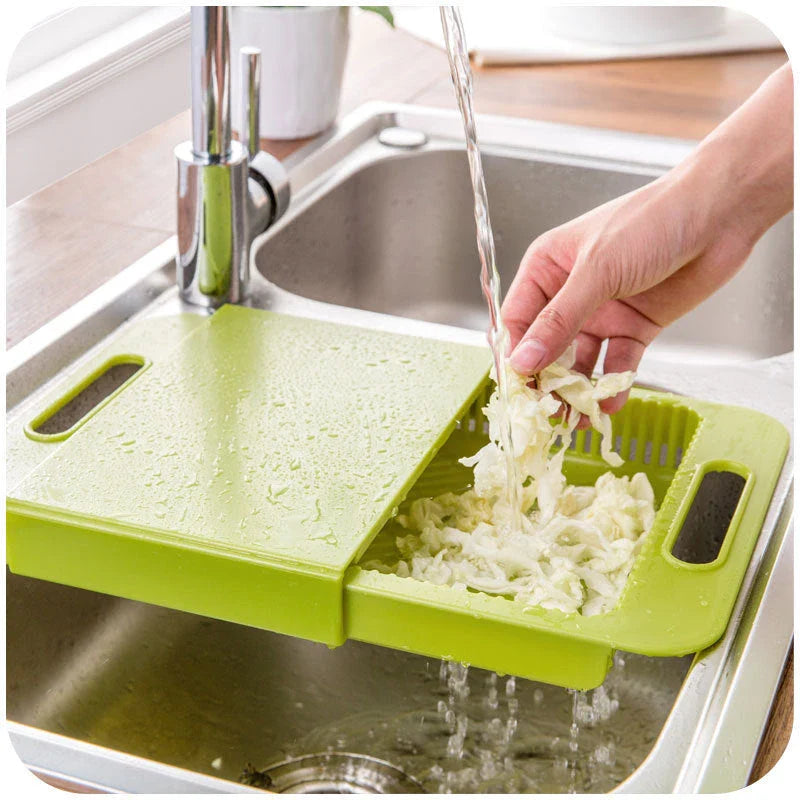 Multifunctional cutting board with integrated strainer and storage tray, made of durable PP material with flexible, rake-shaped body for comfortable chopping