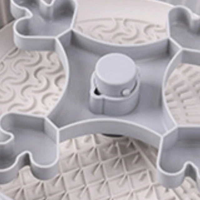 Grey rotating pet food basin with silicone pad showing beard pattern design for slow feeding