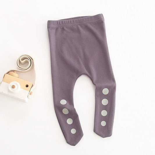 Baby pantyhose with closed crotch in cotton fabric, showing apricot and smoky purple colour options with foot pants design