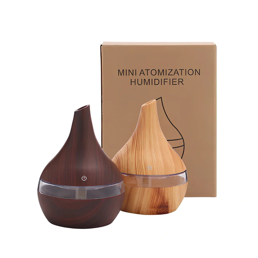 Round wood grain humidifier with USB cable on wooden surface