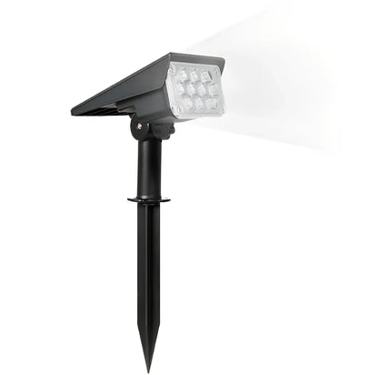 Adjustable solar garden light with black ABS/PC housing and directional spotlight head