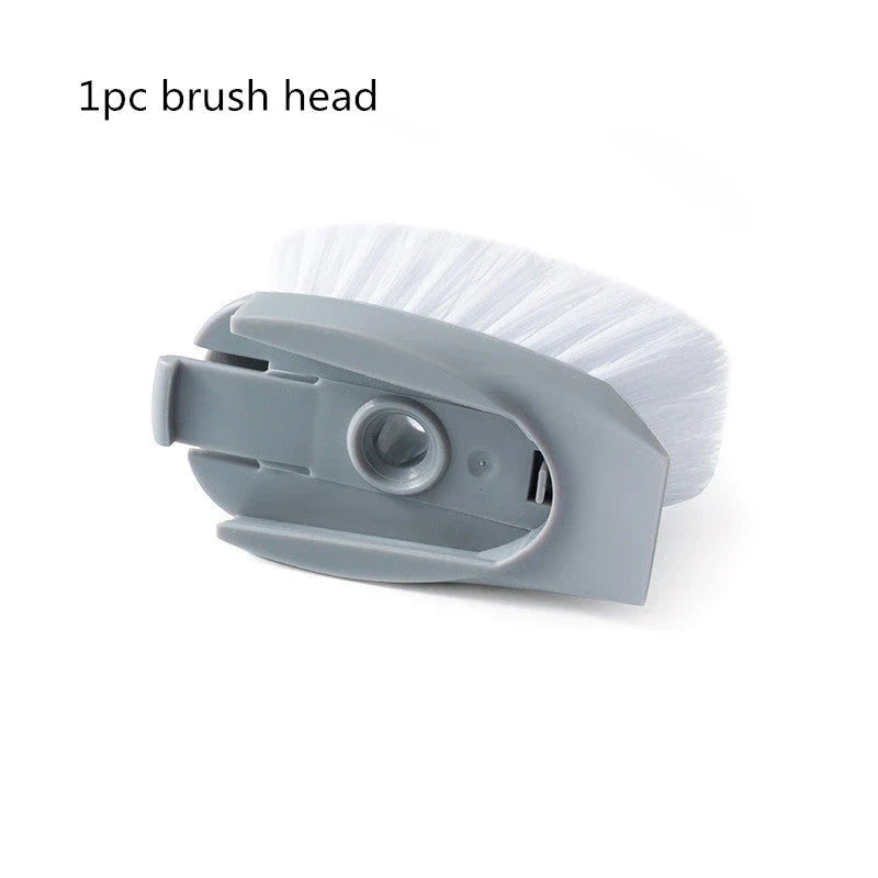 Long-handled kitchen cleaning brush with removable head, designed for efficient and hygienic scrubbing of dishes, bowls, and surfaces.