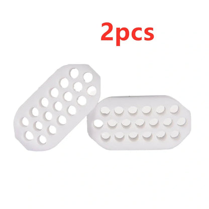 Compact black silicone jaw trainer for muscle shaping, food-grade material, portable at 5cm size for daily facial exercises