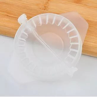 Plastic dumpling maker device in blue, green, and white for quick, uniform dumplings