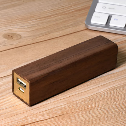 Brown walnut wood portable power bank with 2000mAh capacity showing compact rectangular design