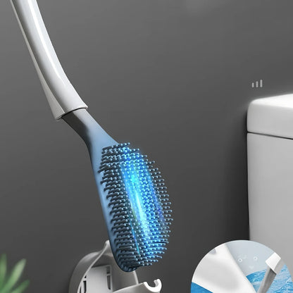 Black silicone bathroom cleaning brush with soft head and curved ergonomic handle for easy grime removal