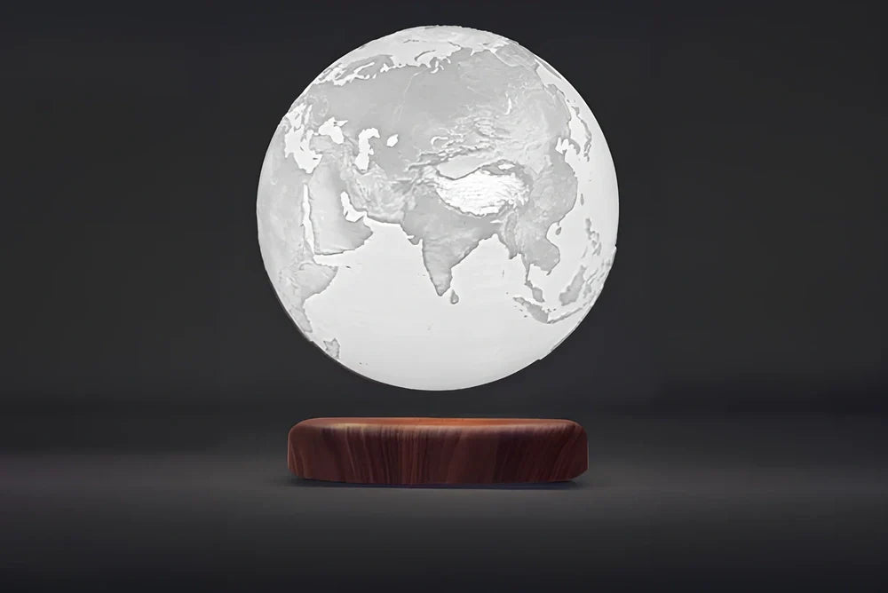 Levitating Earth or Jupiter lamp floating above base with LED illumination