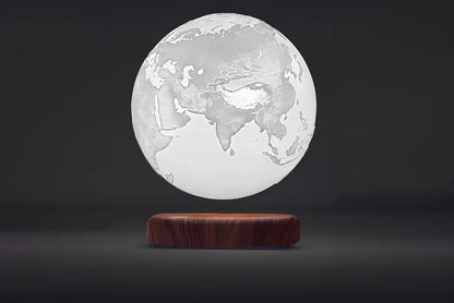 Levitating Earth or Jupiter lamp floating above base with LED illumination