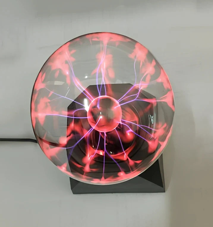 Plasma ball lightning ball with glass spherical shell showing colourful linear light and interactive touch response