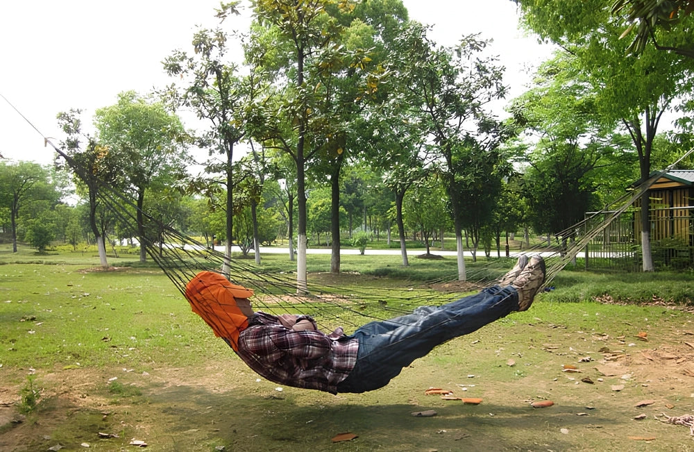 Nylon rope mesh hammock with steel hoops showing breathable construction and compact folded size