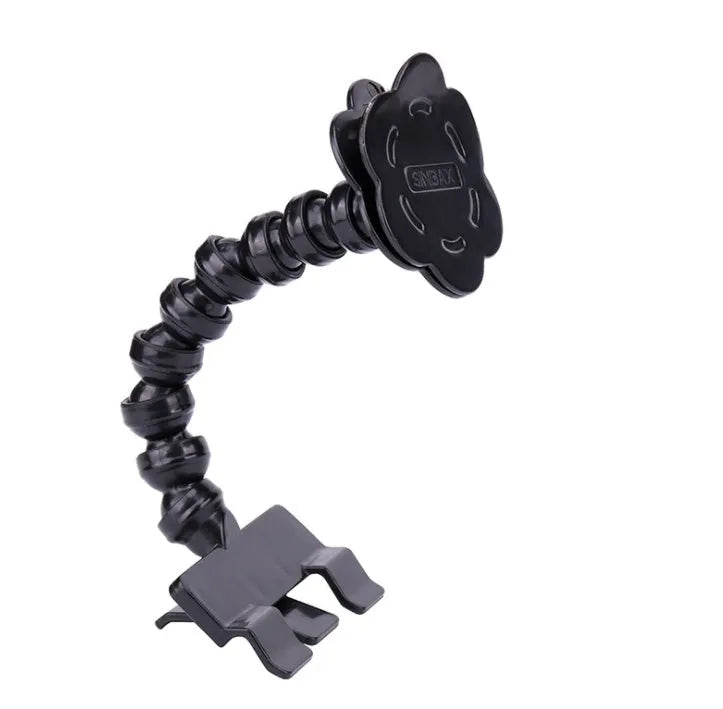 Black pet selfie stick with adjustable arm and flower clip holding a smartphone next to a dog.