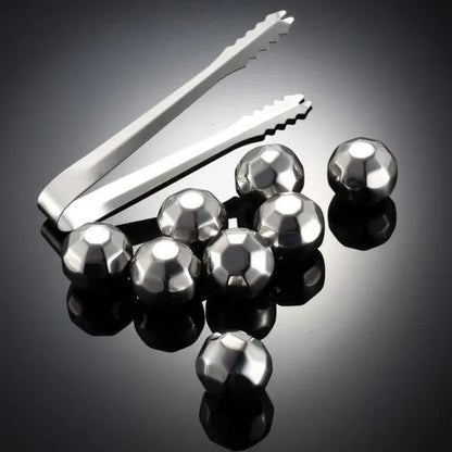 Set of eight stainless steel whiskey cooling stones with metal clip in plastic storage container