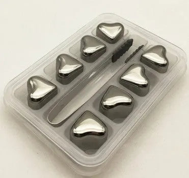 Set of eight stainless steel whiskey cooling stones with metal clip in plastic storage container